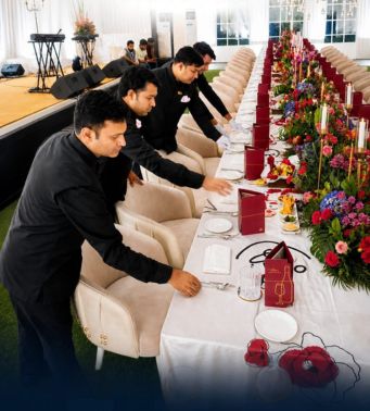 Professional butler and captain team in uniform